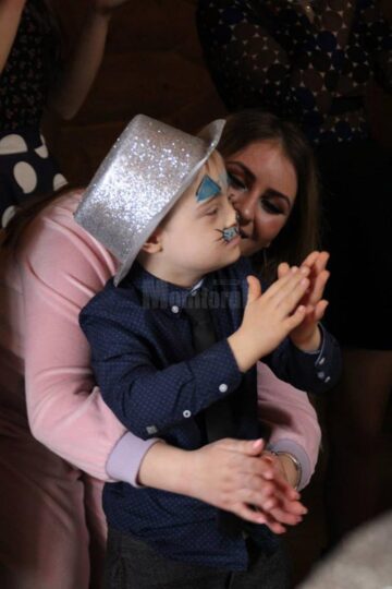 Petrecere pentru 23 de copii care suferă de autism și sindrom Down