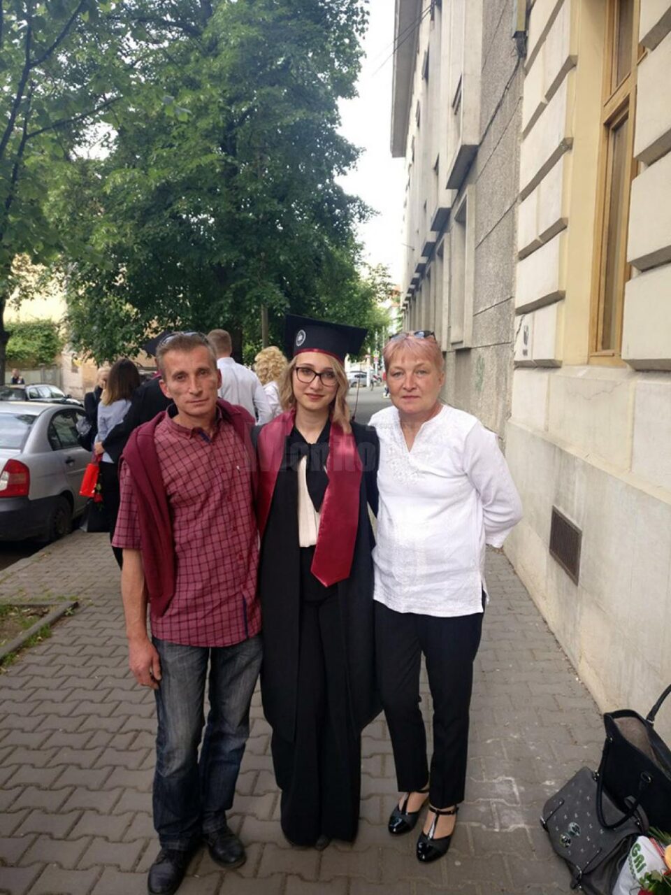 Olimpia, alături de părinții săi