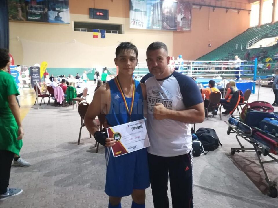 Noul campion național de juniori alături de antrenorul său
