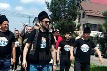 Provocarea lansată de Ștefan Mandachi, îmbrăcat cu cușmă și bundiță