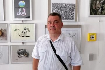 Caricaturistul Ovidiu Ambrozie Bortă BOA , organizator și membru al juriului