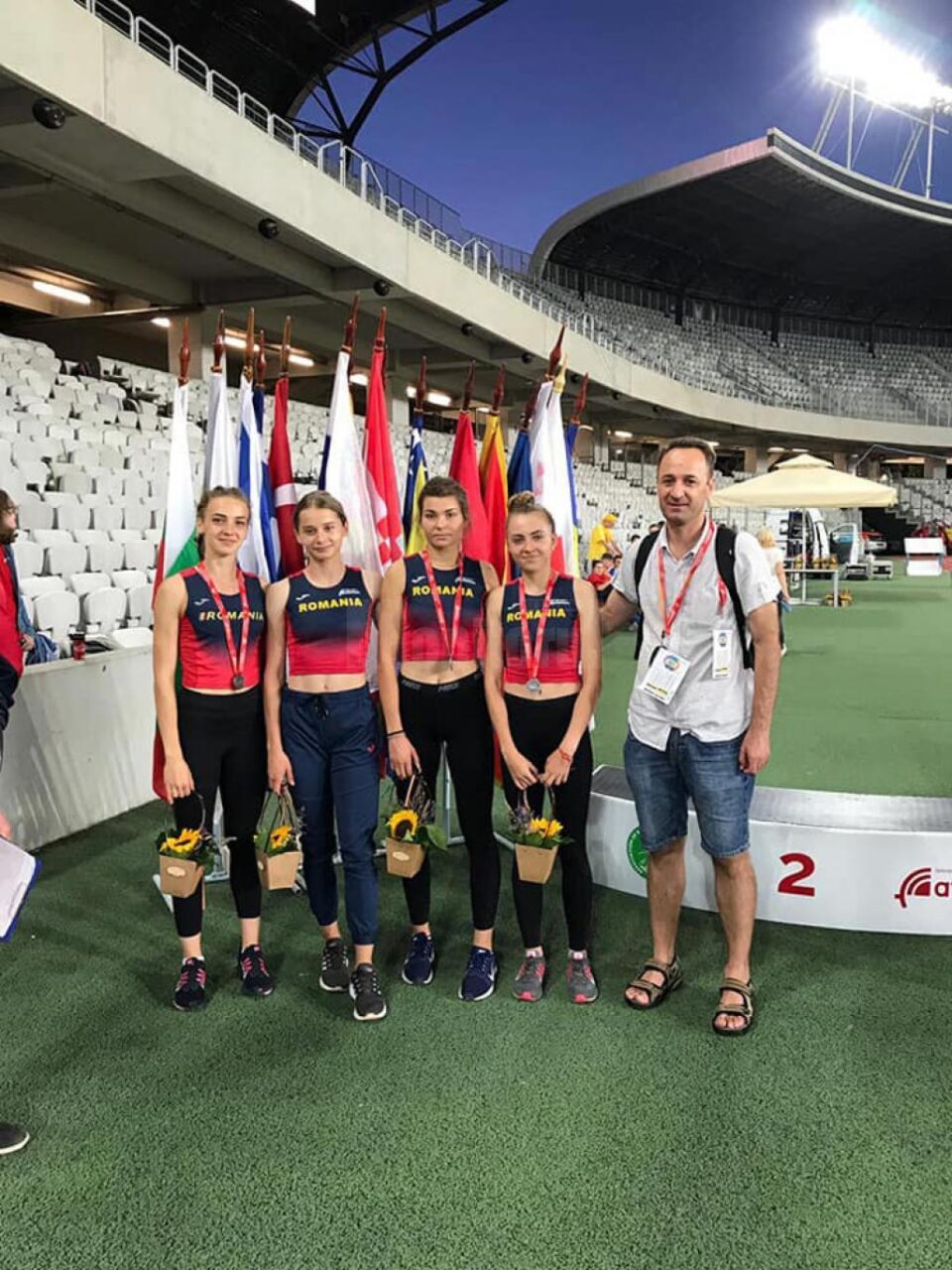 Antrenorul Silviu Casandra si atleta Roxana Ghiuta