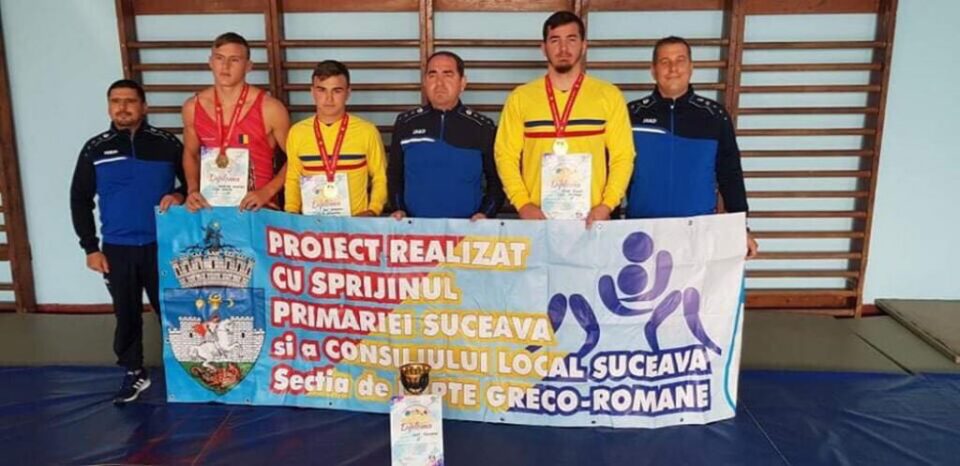 Antrenorii și trei dintre elevii acestora