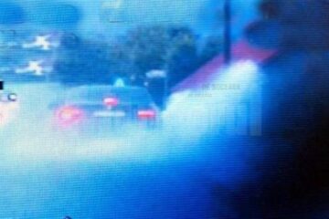 BMW-ul condus nebuneste pe ploaie torentială