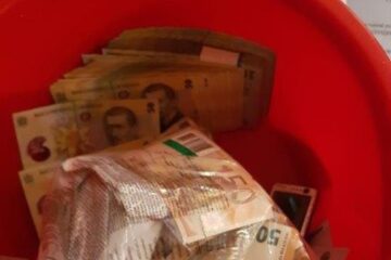 Aproape două milioane de euro ascunși inclusiv în găleți, ridicați în dosarul de corupție de la Serviciul de Permise și Înmatriculări