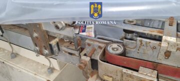 Descindere la o fabrică clandestină de țigarete unde polițiștii au dat și peste un autotren în care erau bine ascunse 2,2 milioane de țigarete