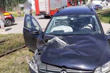 Autovehicul lovit de tren, la Bivolărie