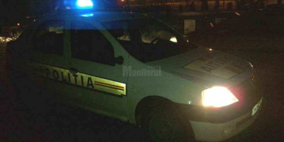 Mașină de poliție noaptea