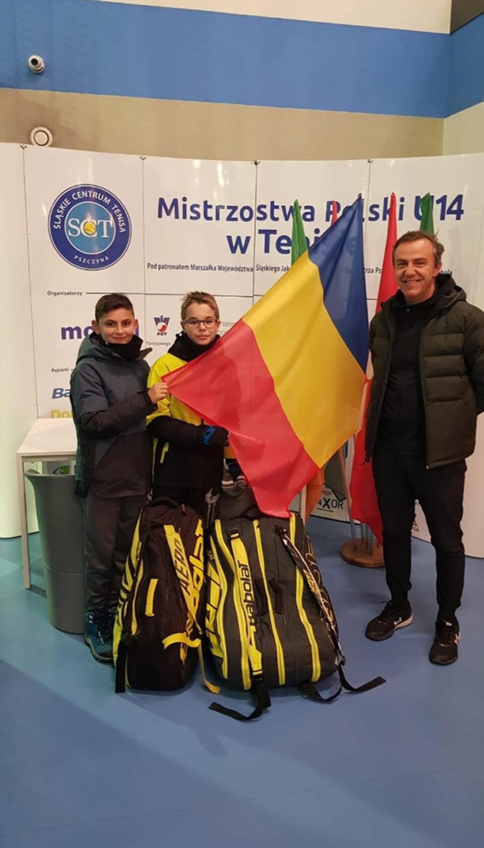 Cei doi jucători români și antrenorul Lechner