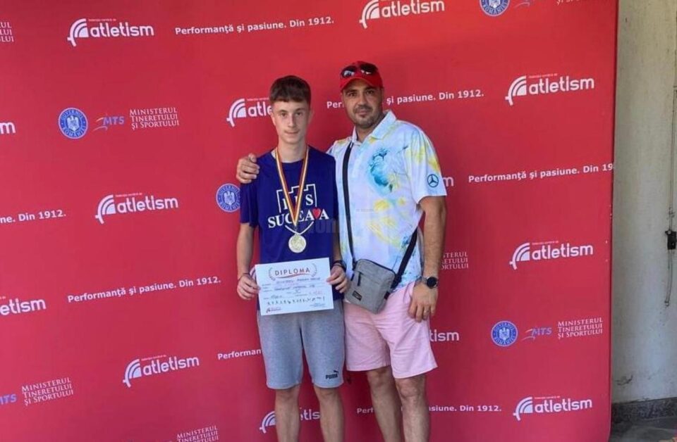 Antrenorul Iustin Tătărău alături de sportivul Marian Ignătescu